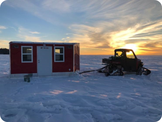 Aluma Lite Skid Ice House on Lake with Sunset